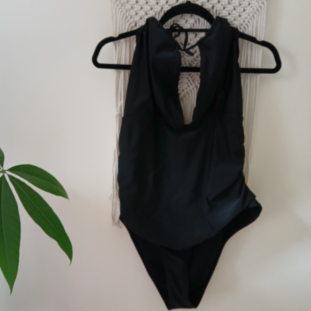 Deep plunge ruched black swimsuit